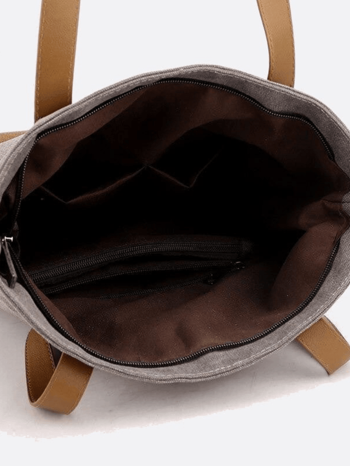 Canvas bag carried on the shoulder and back