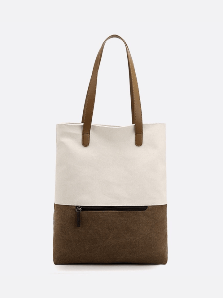 Sac toile blanc porté épaule et dos